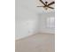 Large bedroom with ceiling fan and neutral carpeting at 2525 Hamonah Dr, Henderson, NV 89044