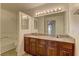 Bright bathroom features a double sink vanity with granite countertop and ample lighting, perfect for modern living at 2801 N Rainbow Blvd # 255, Las Vegas, NV 89108