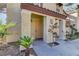 Close-up of front entrance with covered porch and meticulously maintained landscaping at 2801 N Rainbow Blvd # 255, Las Vegas, NV 89108