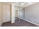 Mirrored closet doors in a carpeted bedroom at 3126 Cabachon Ave, Las Vegas, NV 89121