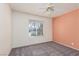 Bedroom with peach wall and carpet flooring at 3126 Cabachon Ave, Las Vegas, NV 89121