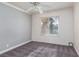 Spacious bedroom with grey walls and carpet at 3126 Cabachon Ave, Las Vegas, NV 89121