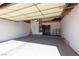 Attached garage with storage shelving and water heater at 3126 Cabachon Ave, Las Vegas, NV 89121