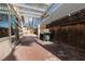 Backyard patio area with pergola, grill, and wooden fence at 3126 Cabachon Ave, Las Vegas, NV 89121