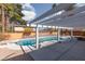 Relaxing pool area with pergola and diving board at 3126 Cabachon Ave, Las Vegas, NV 89121