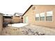 Private backyard with patio and gravel landscaping at 3317 Barada Heights Ave, North Las Vegas, NV 89081