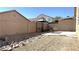 Private backyard features a patio, rock accents, gazebo and block wall at 3317 Barada Heights Ave, North Las Vegas, NV 89081