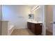 Bathroom features a double sink vanity and a separate tub and toilet area at 3317 Barada Heights Ave, North Las Vegas, NV 89081