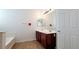 Bathroom with double vanity, large mirror, and bathtub at 3317 Barada Heights Ave, North Las Vegas, NV 89081