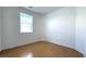 Bright bedroom with hardwood floors and a window providing natural light at 3317 Barada Heights Ave, North Las Vegas, NV 89081