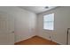 Small bedroom with wood floors and closet at 3317 Barada Heights Ave, North Las Vegas, NV 89081