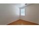 Simple bedroom with wood floors and window at 3317 Barada Heights Ave, North Las Vegas, NV 89081