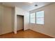 Bright bedroom with wood floors and closet at 3317 Barada Heights Ave, North Las Vegas, NV 89081