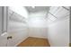 Walk-in closet with wire shelving and hardwood floors at 3317 Barada Heights Ave, North Las Vegas, NV 89081