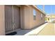 Inviting front entrance featuring a double door entry, desert landscaping, and a covered porch at 3317 Barada Heights Ave, North Las Vegas, NV 89081