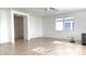 Bright and spacious living room featuring tile flooring, recessed lighting, and large windows at 3317 Barada Heights Ave, North Las Vegas, NV 89081