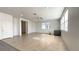 Bright and spacious living room featuring tile flooring, recessed lighting, and large windows at 3317 Barada Heights Ave, North Las Vegas, NV 89081