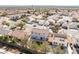 Aerial view showcasing the home's backyard and surrounding neighborhood at 3728 Shimmering Creek Ave, North Las Vegas, NV 89031