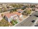 Two story house with artificial turf and a two car garage at 3728 Shimmering Creek Ave, North Las Vegas, NV 89031