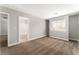 Bedroom with carpet, en-suite bathroom, and window at 3728 Shimmering Creek Ave, North Las Vegas, NV 89031