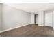 Well-lit bedroom featuring carpet, closet, and door at 3728 Shimmering Creek Ave, North Las Vegas, NV 89031