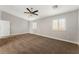 Large main bedroom with ceiling fan and carpet at 3728 Shimmering Creek Ave, North Las Vegas, NV 89031