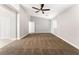 Main bedroom with ceiling fan and carpet flooring at 3728 Shimmering Creek Ave, North Las Vegas, NV 89031