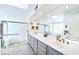 Elegant bathroom with double vanity, large mirror, and glass shower enclosure at 3800 Euclid St, Las Vegas, NV 89121