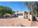 Stunning stucco home with a brick driveway and lush landscaping at 3800 Euclid St, Las Vegas, NV 89121