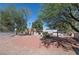 Detached garage with gravel parking area and mature trees at 3800 Euclid St, Las Vegas, NV 89121