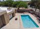 Inviting rectangular pool with surrounding patio and firepit at 3800 Euclid St, Las Vegas, NV 89121