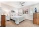 Serene bedroom with a queen-size bed and neutral tones at 3952 Moon Tango St, Las Vegas, NV 89129