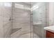 Large walk-in shower with built-in seat at 3952 Moon Tango St, Las Vegas, NV 89129