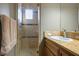 Bathroom featuring glass shower, granite counters, faucet, and sink at 4 Via Centrale # 3, Henderson, NV 89011