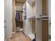 Spacious walk-in closet with custom shelving and ample storage, designed for organized and convenient wardrobe management at 4 Via Centrale # 3, Henderson, NV 89011