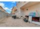 Small backyard with space for a grill and patio furniture at 4064 Emerald Wood St, Las Vegas, NV 89115