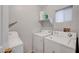 Bright laundry room with washer and dryer at 4064 Emerald Wood St, Las Vegas, NV 89115