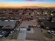 Aerial view of single story home and surrounding neighborhood at sunset at 4083 Eileen St, Las Vegas, NV 89115