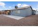 Rear view of house showing gray siding and patio at 4083 Eileen St, Las Vegas, NV 89115