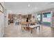 Open concept dining area with kitchen view at 4128 Fossatello Ave, North Las Vegas, NV 89084