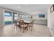 Casual dining area with table and chairs, view to backyard at 4128 Fossatello Ave, North Las Vegas, NV 89084