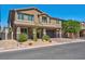 Two-story house with attached garage and landscaping at 4128 Fossatello Ave, North Las Vegas, NV 89084