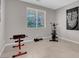 Bright home gym with exercise equipment at 4128 Fossatello Ave, North Las Vegas, NV 89084