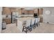 Modern kitchen with stainless steel appliances and granite countertops at 4128 Fossatello Ave, North Las Vegas, NV 89084