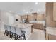 Modern kitchen with stainless steel appliances and granite countertops at 4128 Fossatello Ave, North Las Vegas, NV 89084