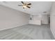 Spacious loft with ceiling fan and carpet at 4128 Fossatello Ave, North Las Vegas, NV 89084