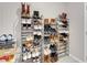 Organized shoe storage with multiple racks for various footwear at 4128 Fossatello Ave, North Las Vegas, NV 89084