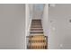 Indoor staircase with a safety gate at 4128 Fossatello Ave, North Las Vegas, NV 89084