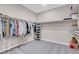 Spacious walk-in closet with ample hanging space and shelving at 4128 Fossatello Ave, North Las Vegas, NV 89084