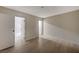 A bright bedroom with wood floors, a neutral color scheme and closet at 413 N Lamb Blvd # E, Las Vegas, NV 89110